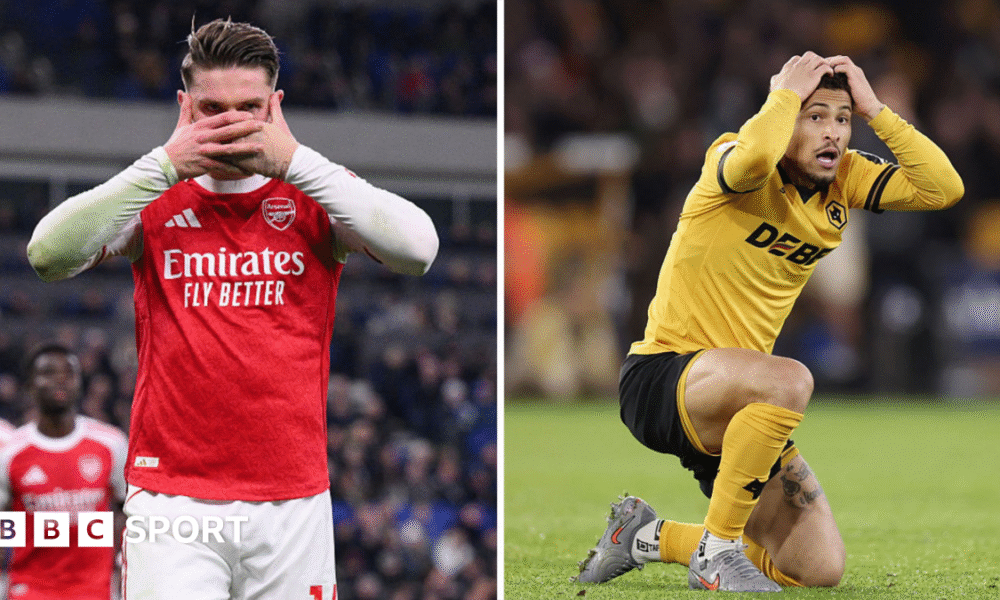 Arsenal celebrate as Wolves look dejected