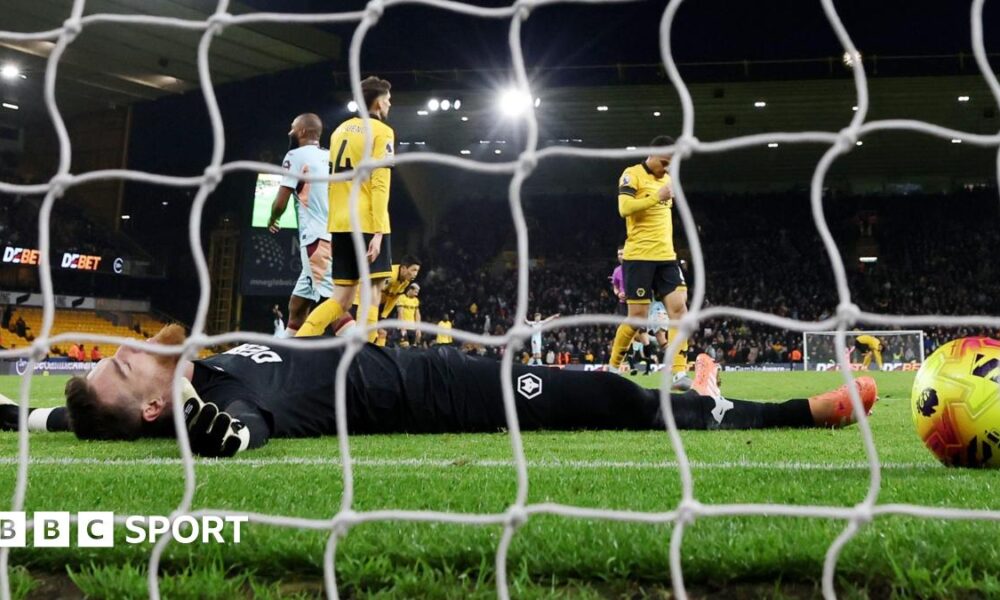 Jose Sa lies on his back after conceding