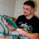 Dalton Smith in the changing rooms looking at his WBC world title