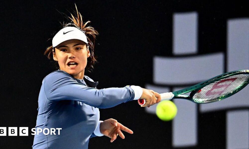 Emma Raducanu plays a forehand shot