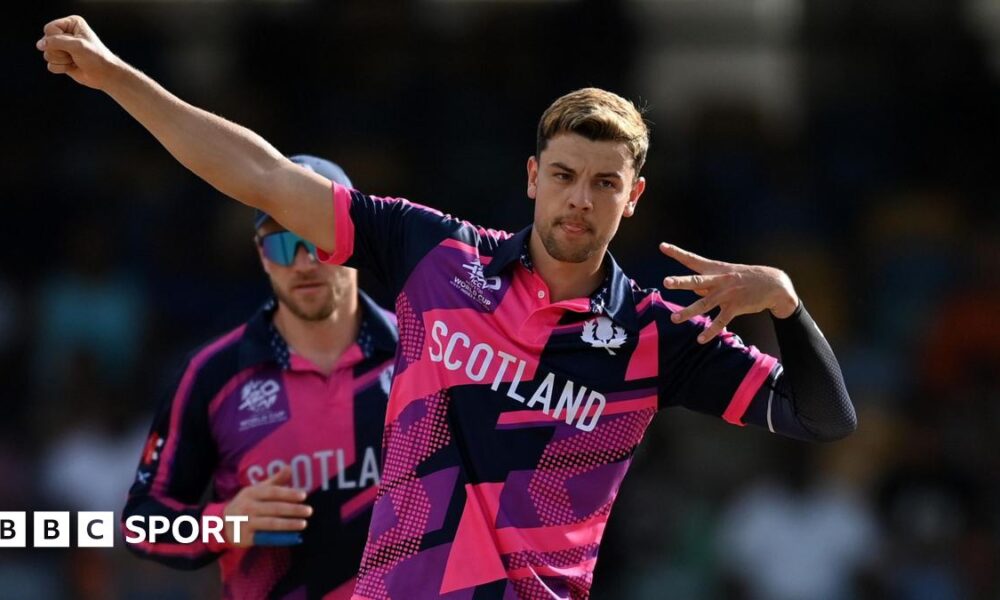 Scotland's Brad Currie celebrates taking a wicket at the 2024 T20 World Cup