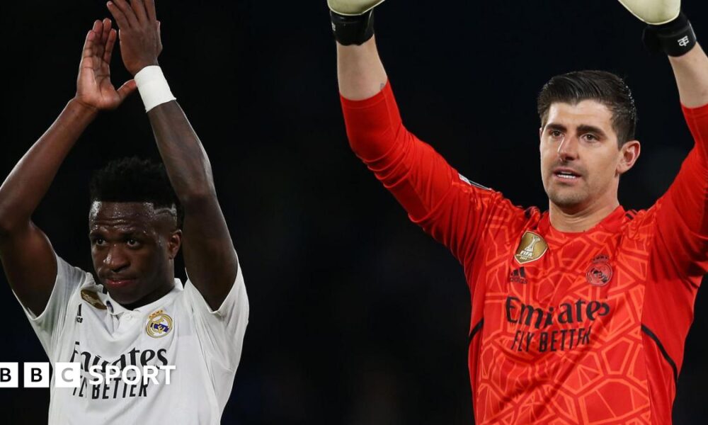 Viniicus Junior and Real Madrid team-mate Thibaut Courtois applaud fans
