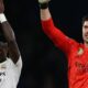 Viniicus Junior and Real Madrid team-mate Thibaut Courtois applaud fans