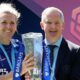 Paul Green alongside Chelsea captain Millie Bright