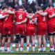 Wales players in a huddle against England