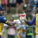 Kusal Mendis and Sri Lanka captain Dasun Shanaka bump fists