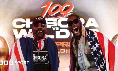 Deontay Wilder and Derek Chisora pose for cameras at a news conference