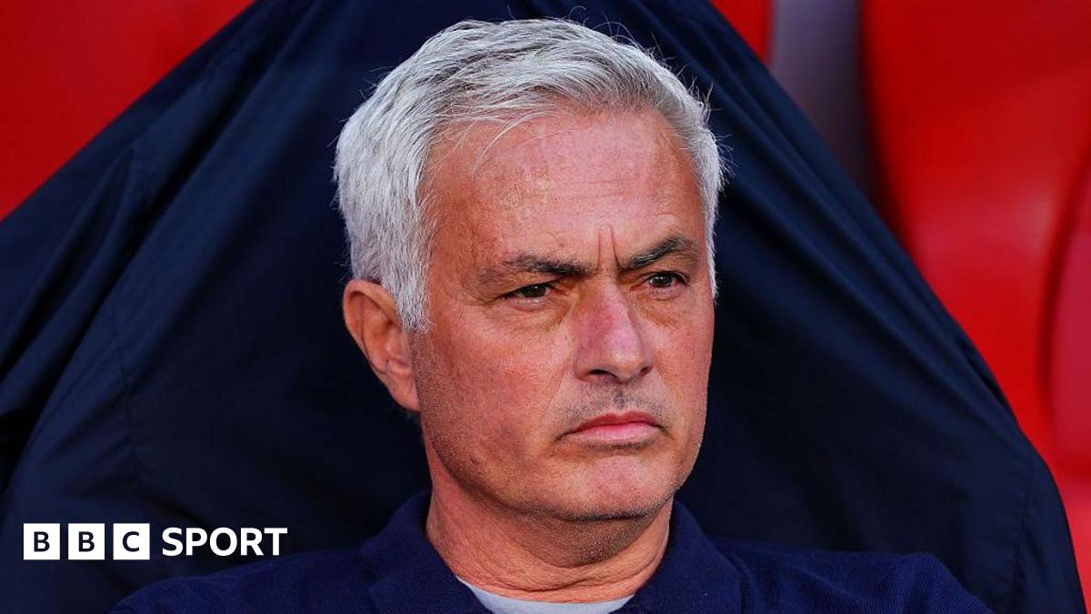 Jose Mourinho looks on in the Benfica dugout