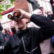 A fan is seen using binoculars outside the stadium prior to the Championship play-off semi-final match between Middlesbrough and Southampton at Riverside Stadium