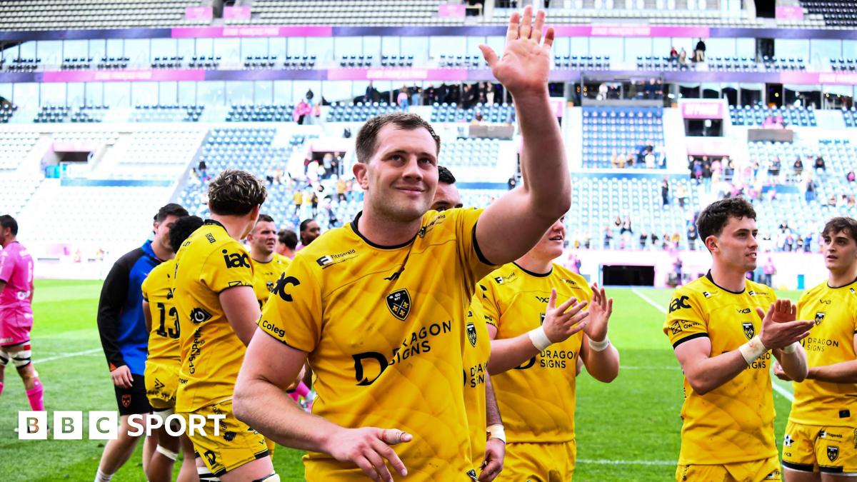 Dragons co-captain Ben Carter waves to the crowd after helping his side beat Stade Francais