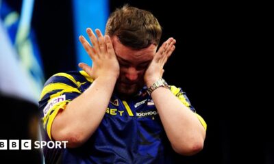 An emotional Luke Littler wipes away tears after beating Luke Humphries to win  the 2026 Premier League Darts