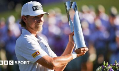 Kristoffer Reitan holding his trophy aloft after winning the Truist Championship in 2026