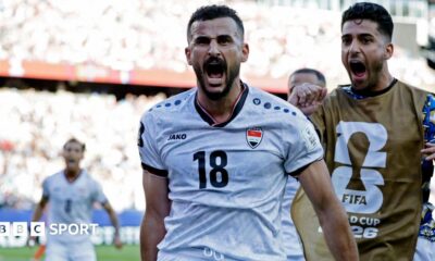 Iraq's Aymen Hussein celebrates scoring their first goal