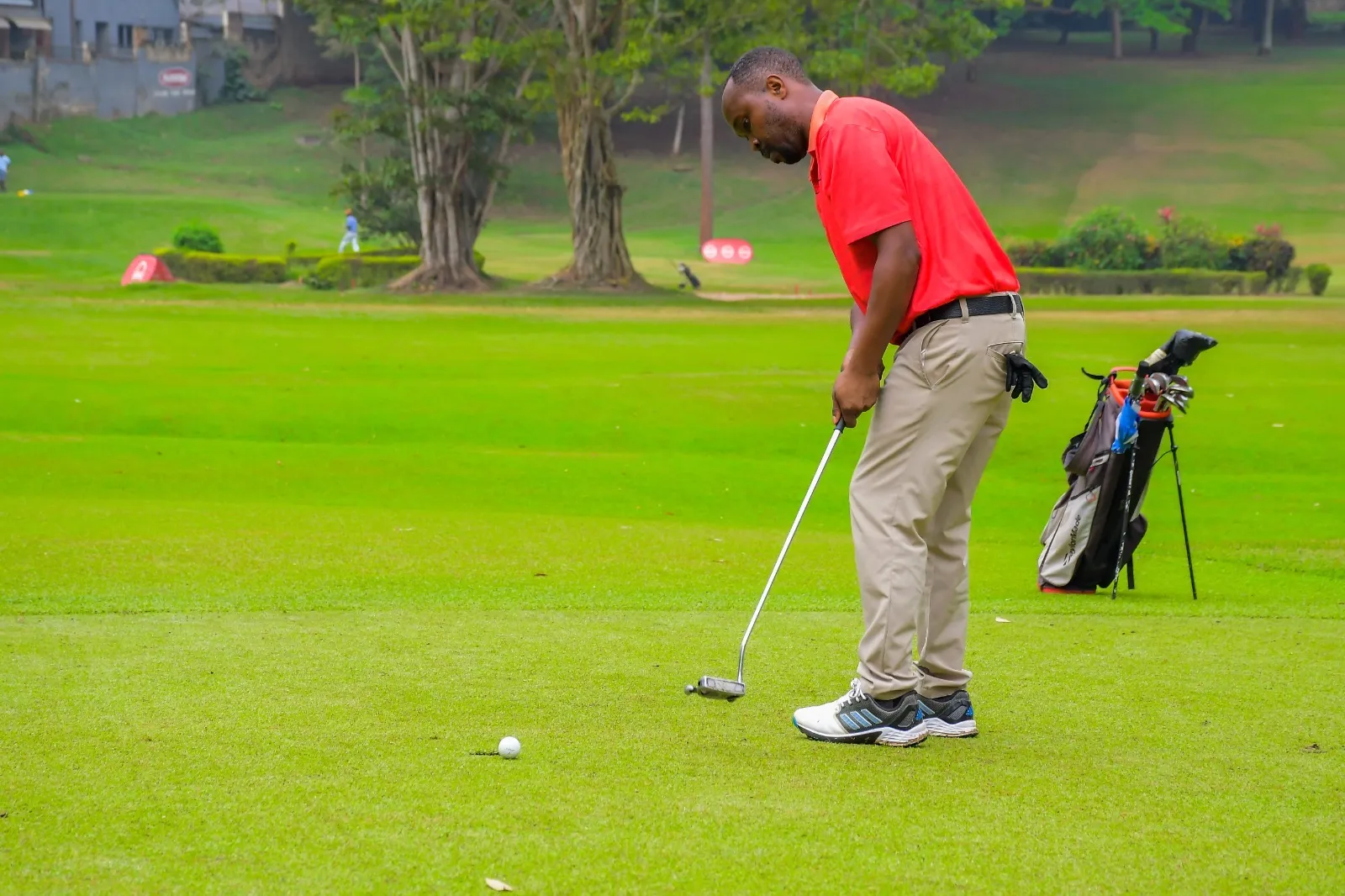 Absa Chairman’s Bell Tees Off as Basil Atinoi Makes His Mark in Inaugural Caddies Match