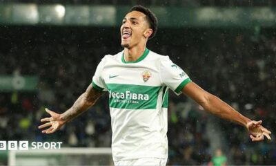 Alvaro Rodriguez celebrates a goal for Elche with his arms out wide