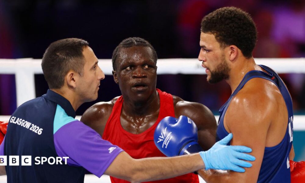 Aziz Abdul reacts after being disqualified for a headbutt during fight against England's Damar Thomas
