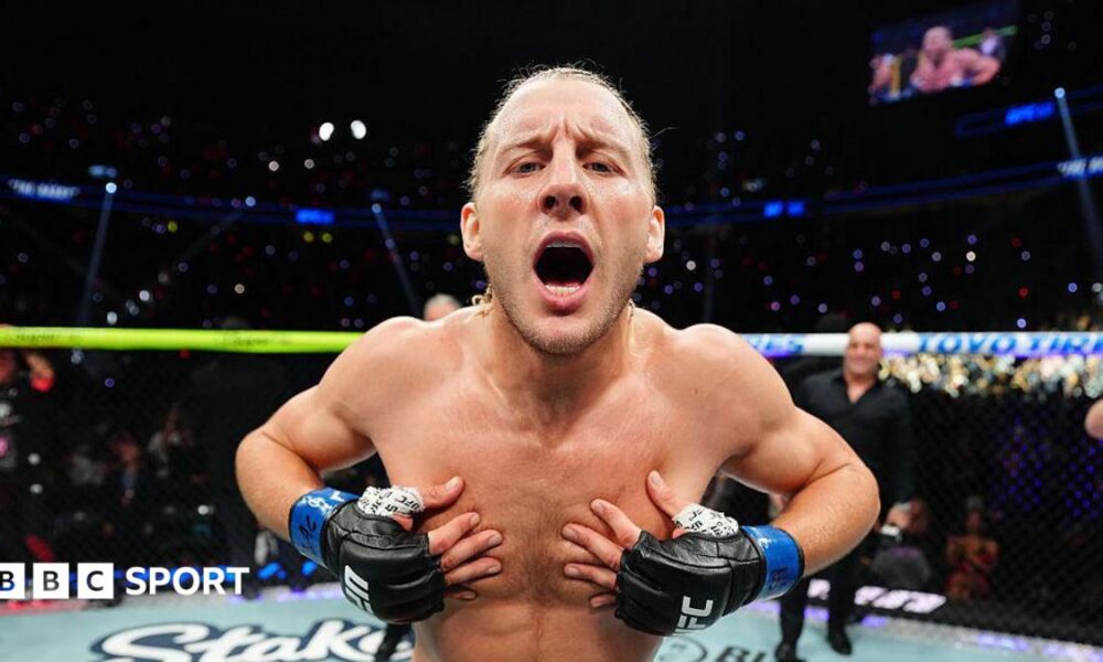Paddy Pimblett celebrates after winning at UFC 329