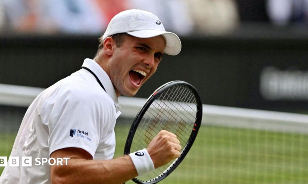 Arthur Fery celebrates at Wimbledon