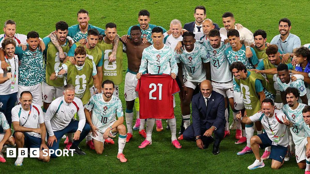 Cristiano Ronaldo holds Diogo Jota's '21' shirt aloft for Portugal