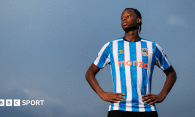 Stephen Mfuni poses in Coventry City's 2025-26 kit