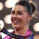 Amy Hunt celebrates with her gold medal in Birmingham