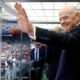 FIFA president Gianni Infantino waves before the World Cup final between Spain and Argentina