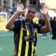Monica Jusu Bah waving to the crowd while wearing a BK Hacken kit