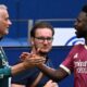Jose Mourinho shaking hands with Vinicius Junior during Real Madrid's friendly with Schalke
