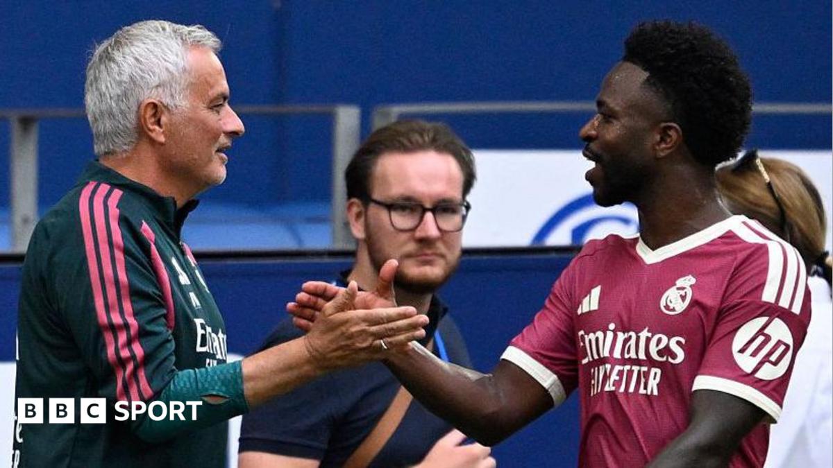 Jose Mourinho shaking hands with Vinicius Junior during Real Madrid's friendly with Schalke