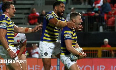 George Williams (right) celebrates scoring for Warrington against Hull KR