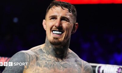 Tom Aspinall is shirtless and has a mouthguard in