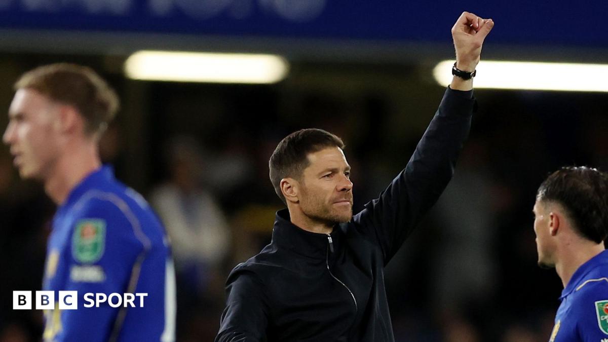 Xabi Alonso celebrates after Chelsea's win over Leeds United, raising his left arm in a satisfied salute