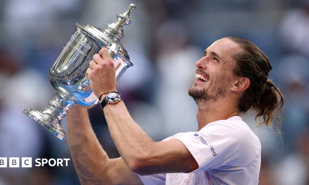 Alexander Zverev celebrates with the US Open trophy