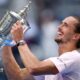 Alexander Zverev celebrates with the US Open trophy