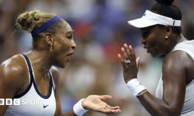 Serena and Venus Williams celebrate winning a point at the 2026 US Open